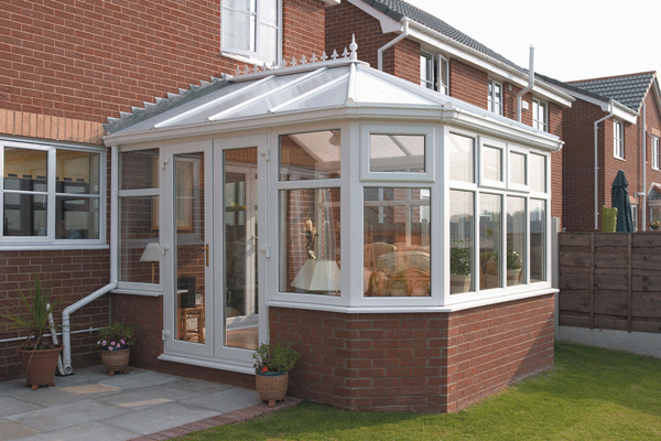  wide fronted victorian white upvc conservatory